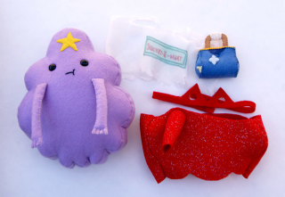 Illustration for article titled We Must Have These Adventure Time Plush Dress-Up Dolls